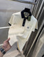 Gucc i Cream Logo Work Imported Polo T-Shirt