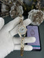 Swarovsk i Hyperbola Bangle Gold White Premium Ladies Watch
