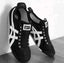 tiger slip on black white