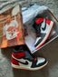 AIR JORDAN RETRO 1 OG BLACK TOE HIGH REIMAGINED