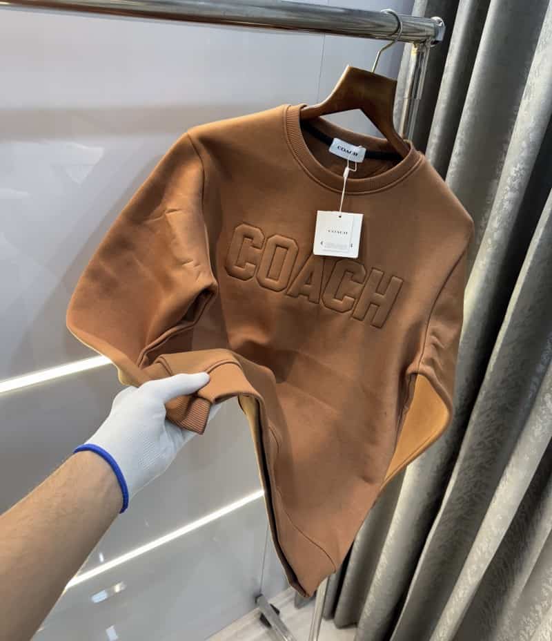 Coac h Brown embosse d Logo Imported Sweatshirt