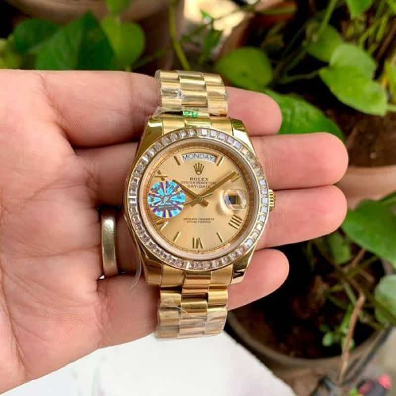 Rolex DayDate Gold Roman Dial Diamo