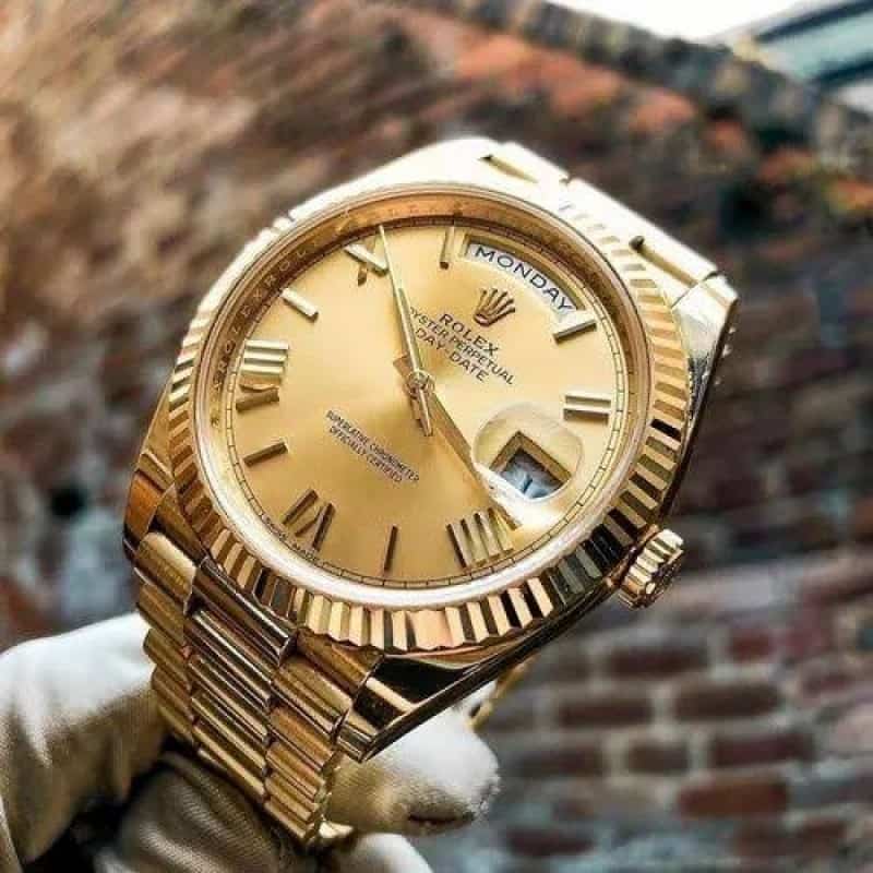 Rolexx daydate gold zr