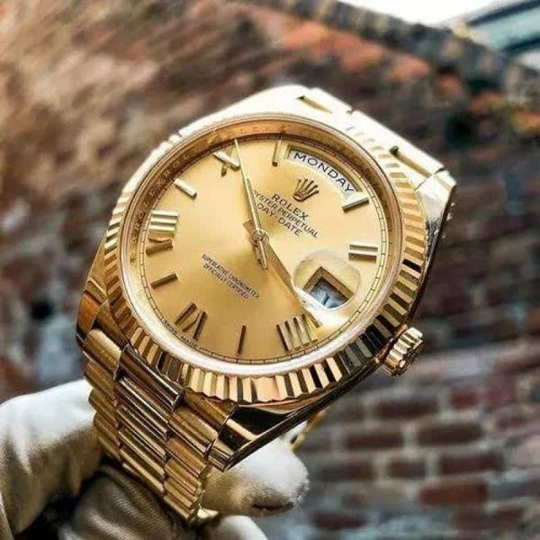 Rolexx daydate gold zr