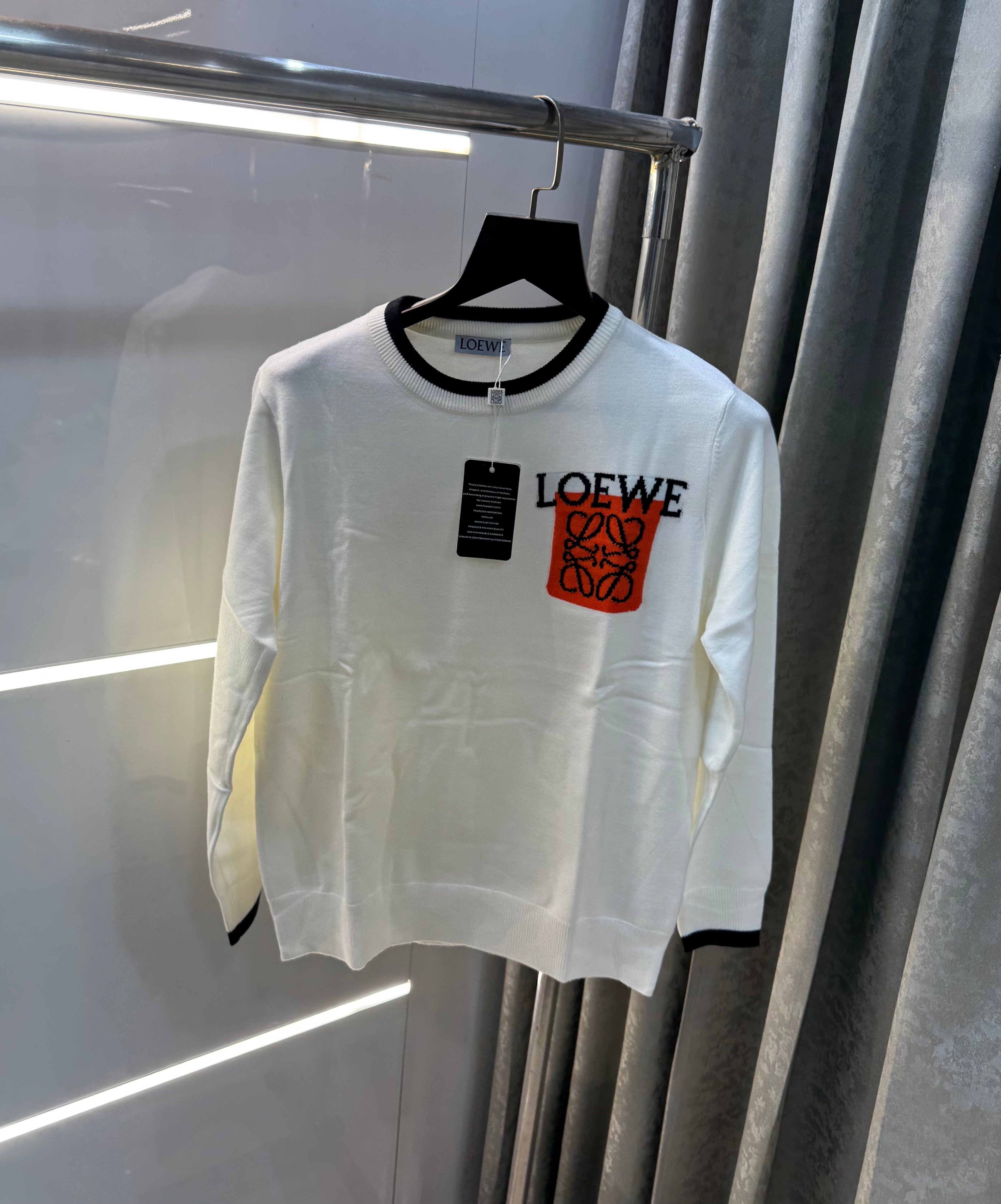 lo...ewe White Imported Knitted Pull Over