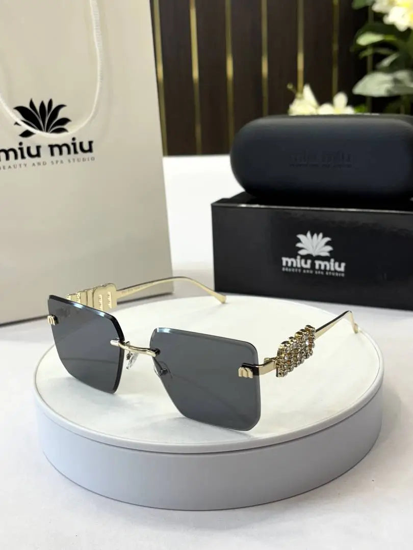 _Miu_miu_1024_frameless_blk_gold Main image