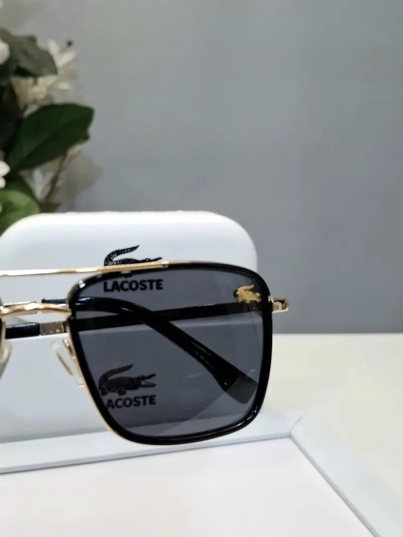_Lacoste_138_black_gold