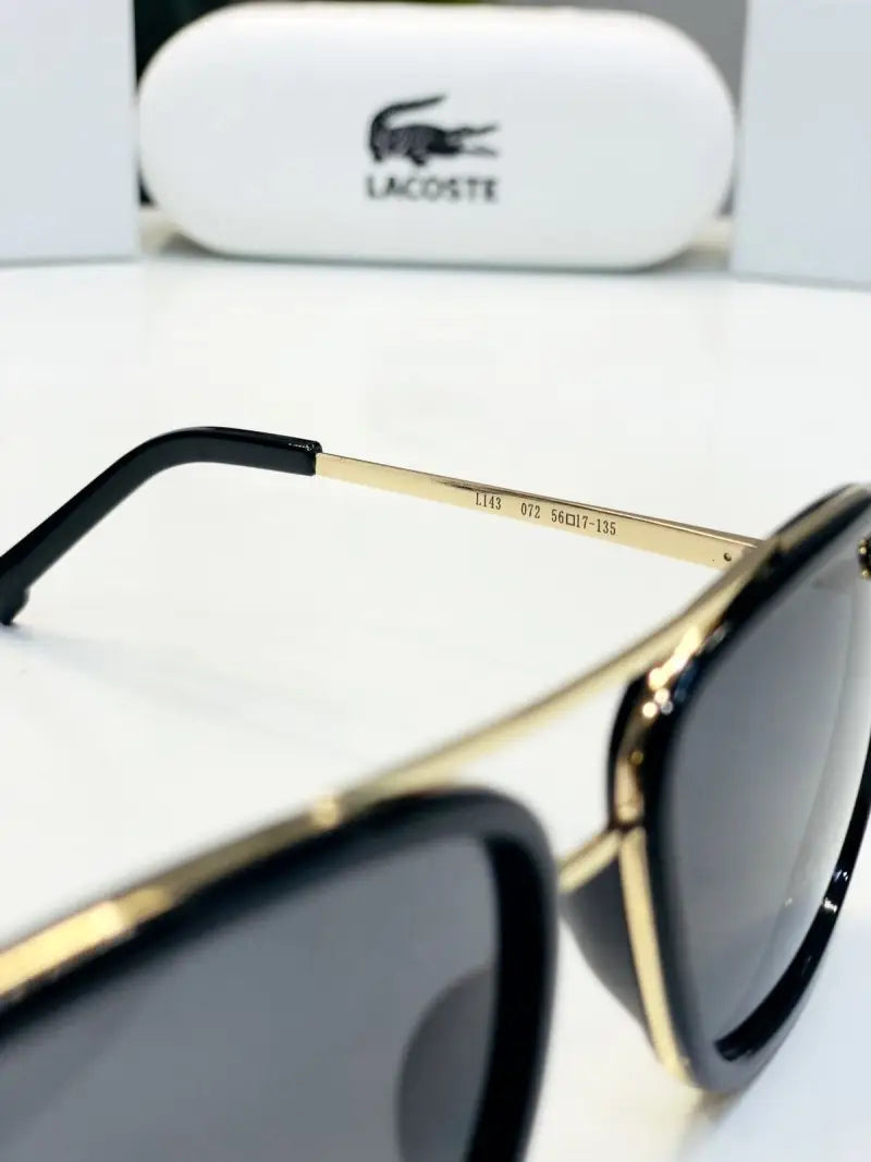 _Lacoste_143_gold_black