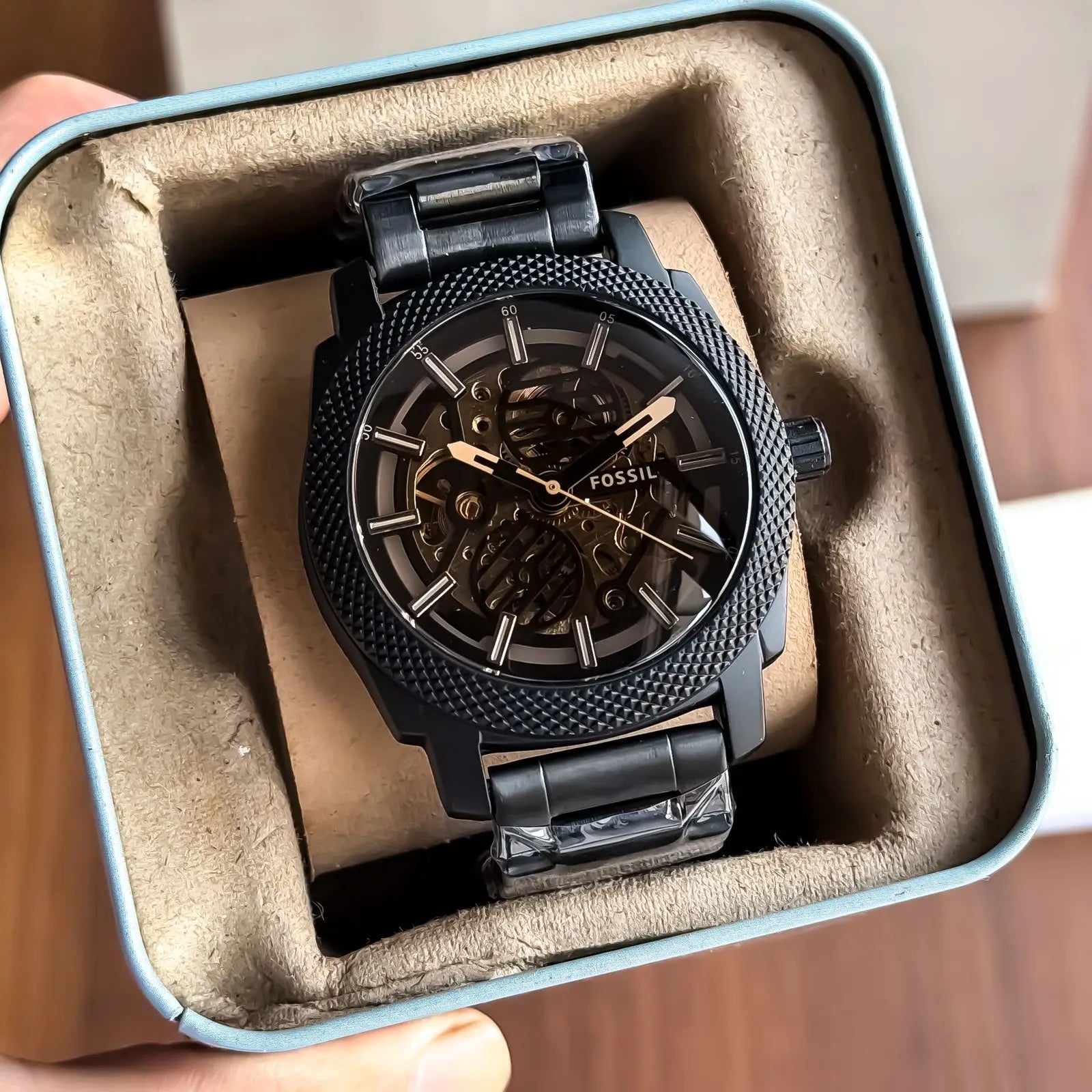 FOSSIL_AUTO_METAL