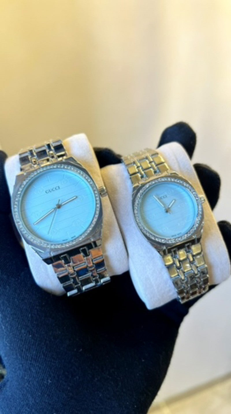 Gucci diamond couple
