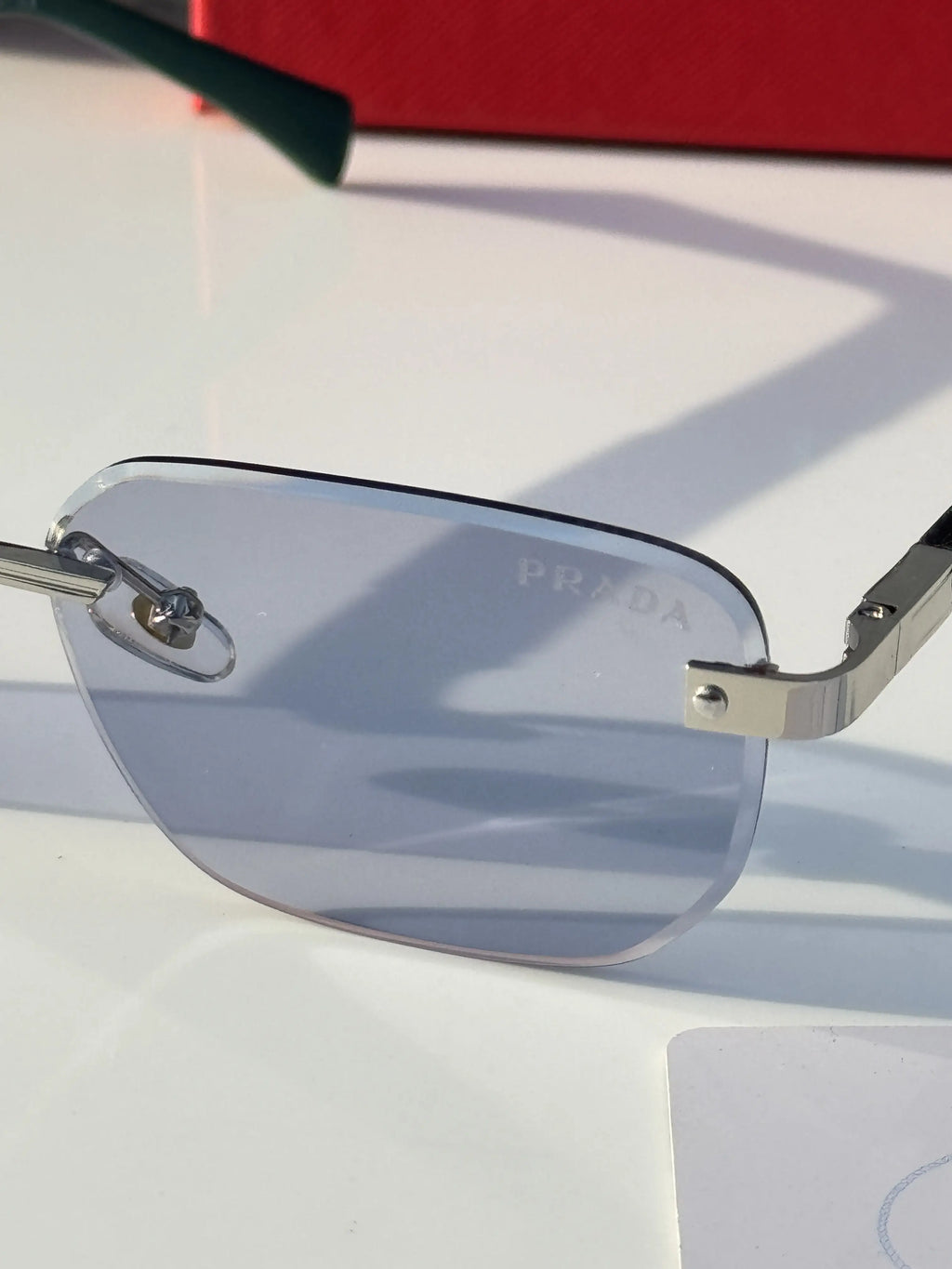 Prada_122_silver_blue_candy