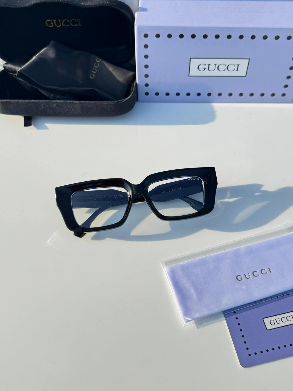 Gucci_69011_black_plano