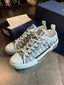 Dio_r B23 Oblique Low Top Sneaker white black canvas with Accessories