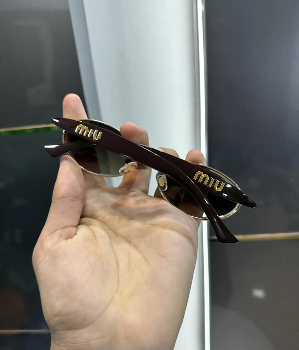 Miu Miu Gold Brown Premium Shades 011