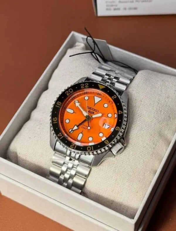 Seiko 5 GMT Orange Back Open 080 Main image