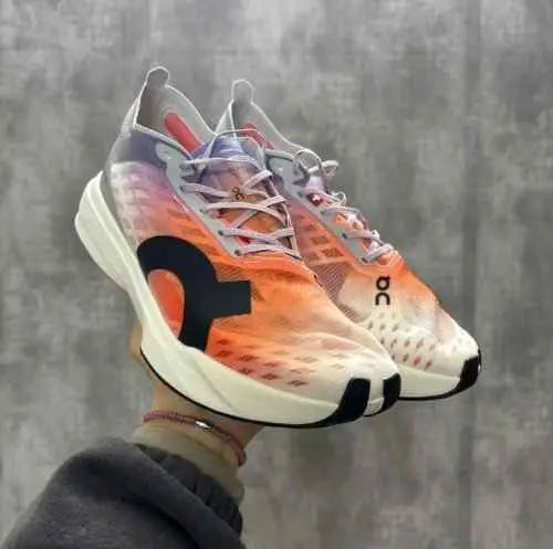 On Cloudboom Strike White Flame with cloud extra insole Secondary image