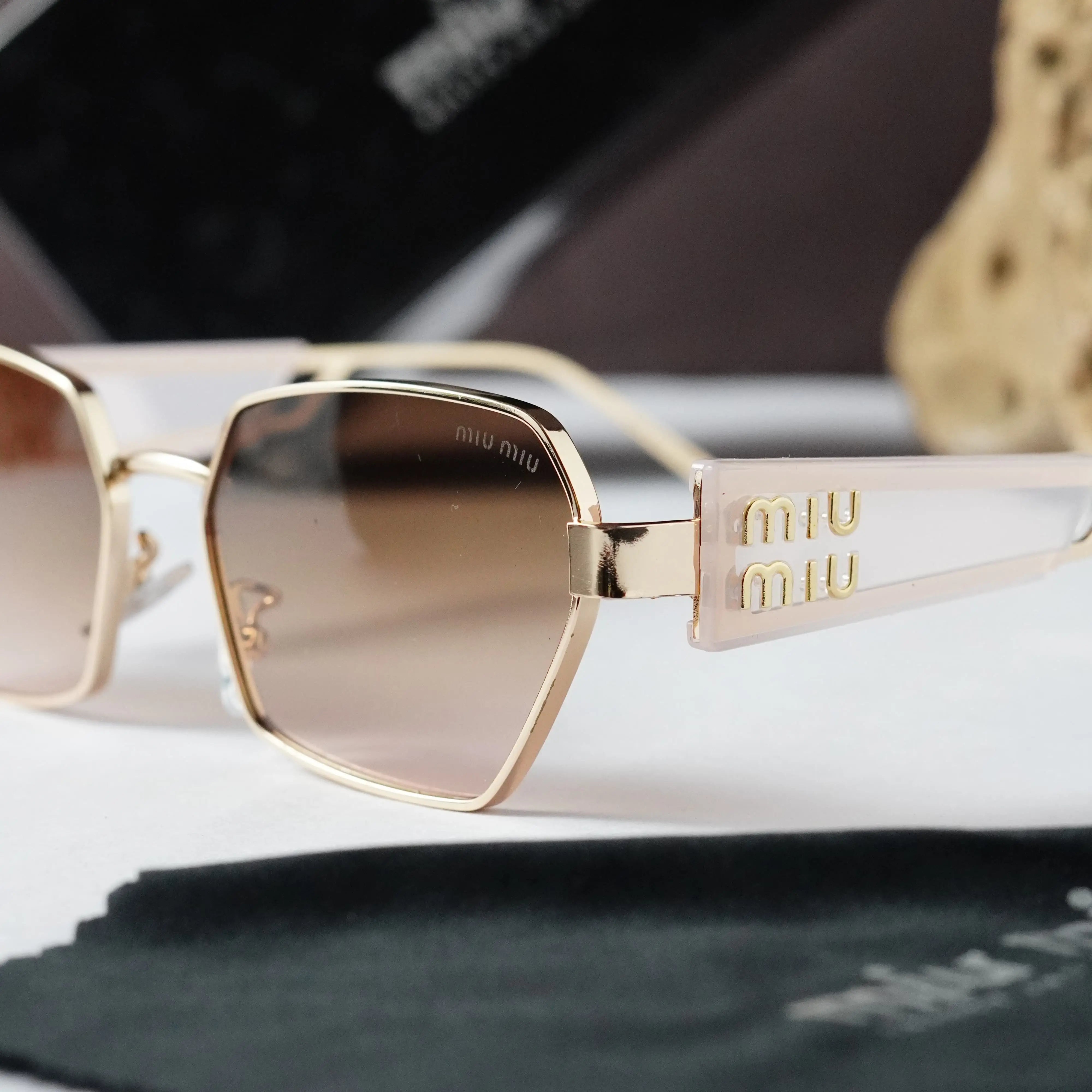 MIU MIU 4059 GOLD BROWN PINK Secondary image