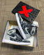 Nik e Jordan Retro 1 High OG Rebellionaire Semi Ua