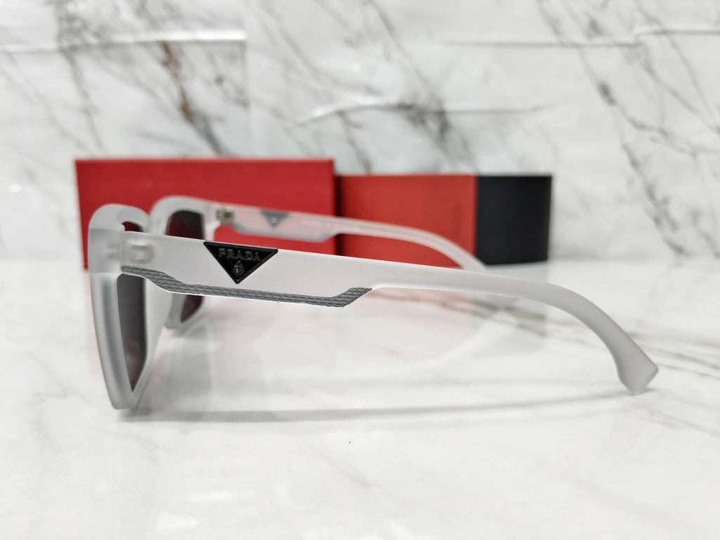 PRADA 0626 TRANSPARENT GREY METAL LOGO