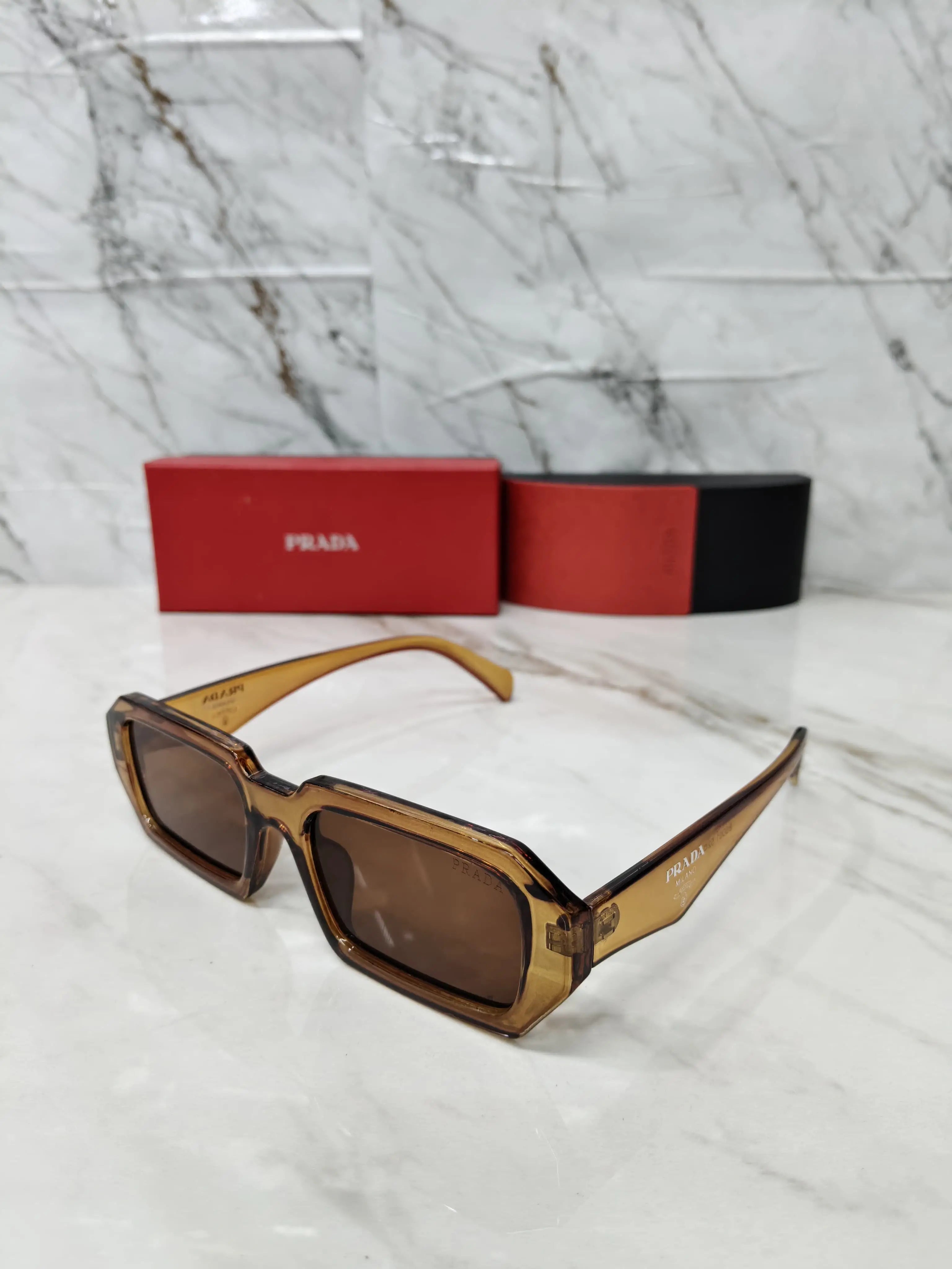 PRADA 01 TRANSPARENT BROWN 