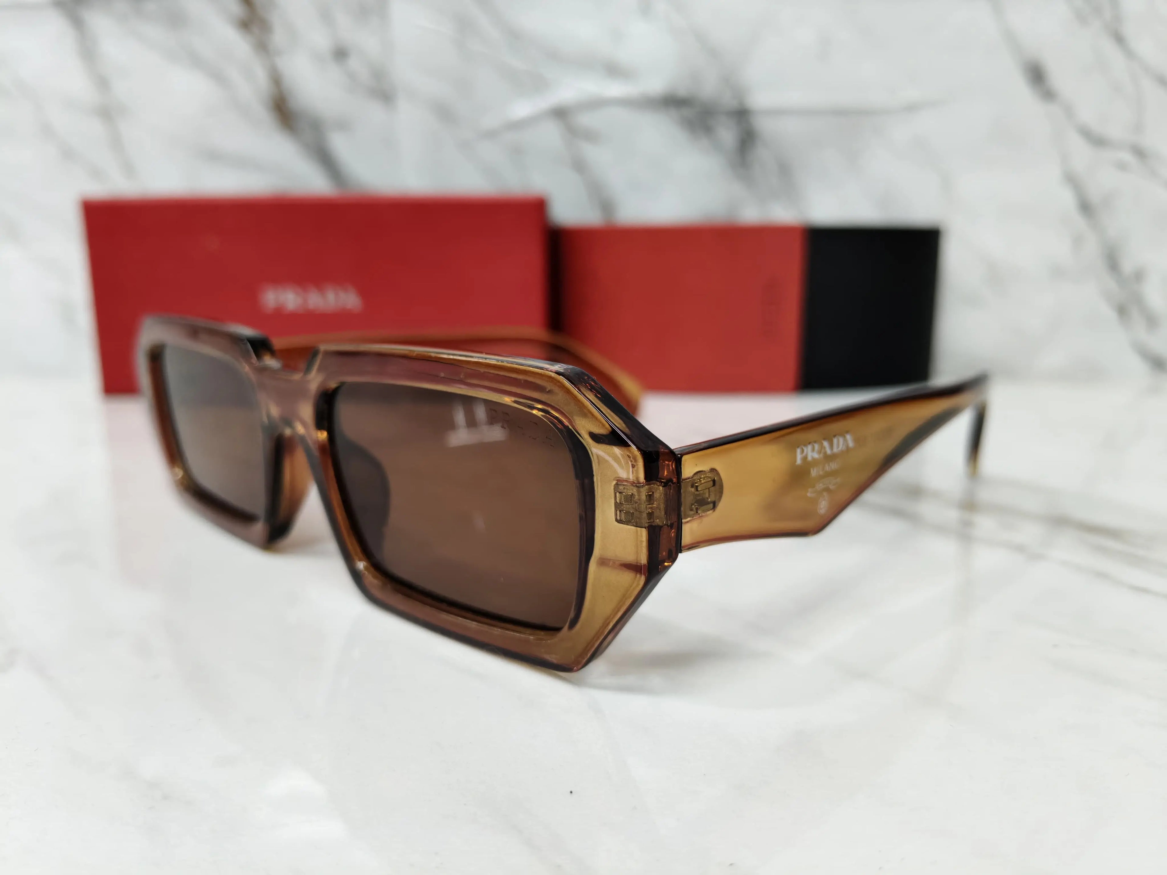 PRADA 01 TRANSPARENT BROWN 