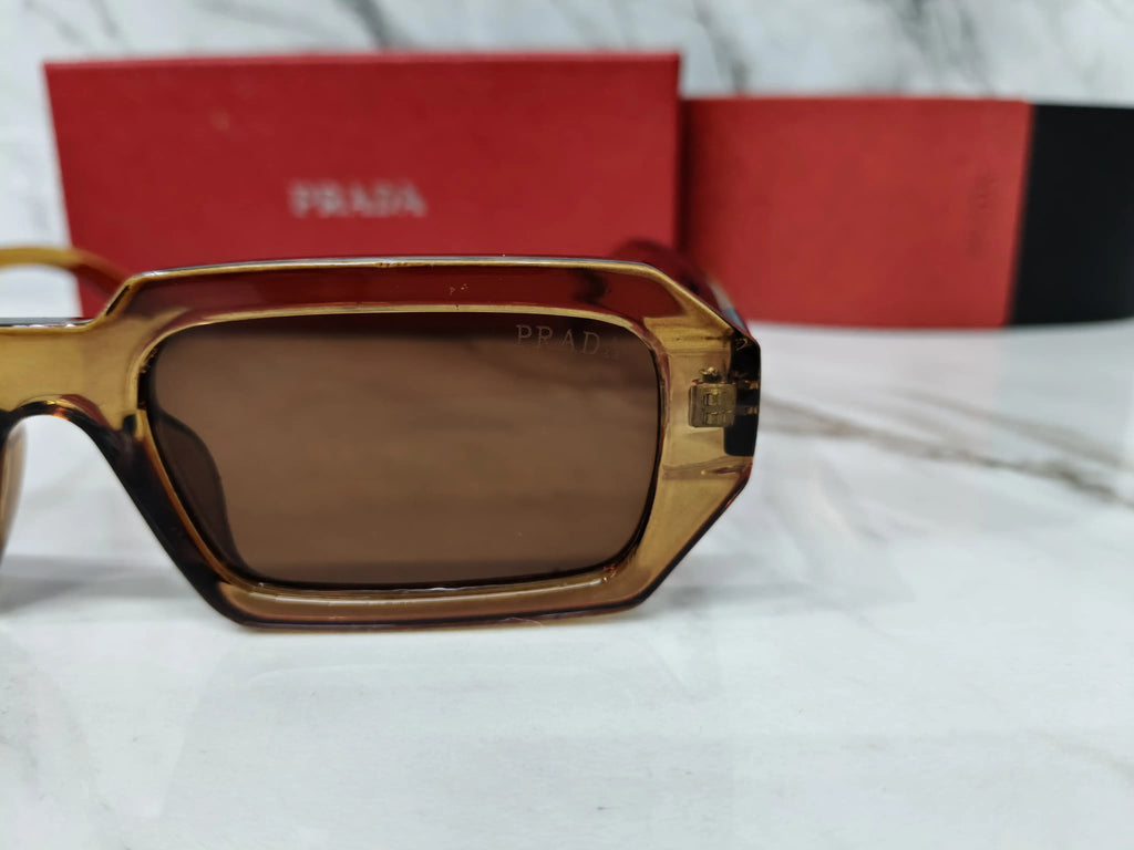 PRADA 01 TRANSPARENT BROWN 