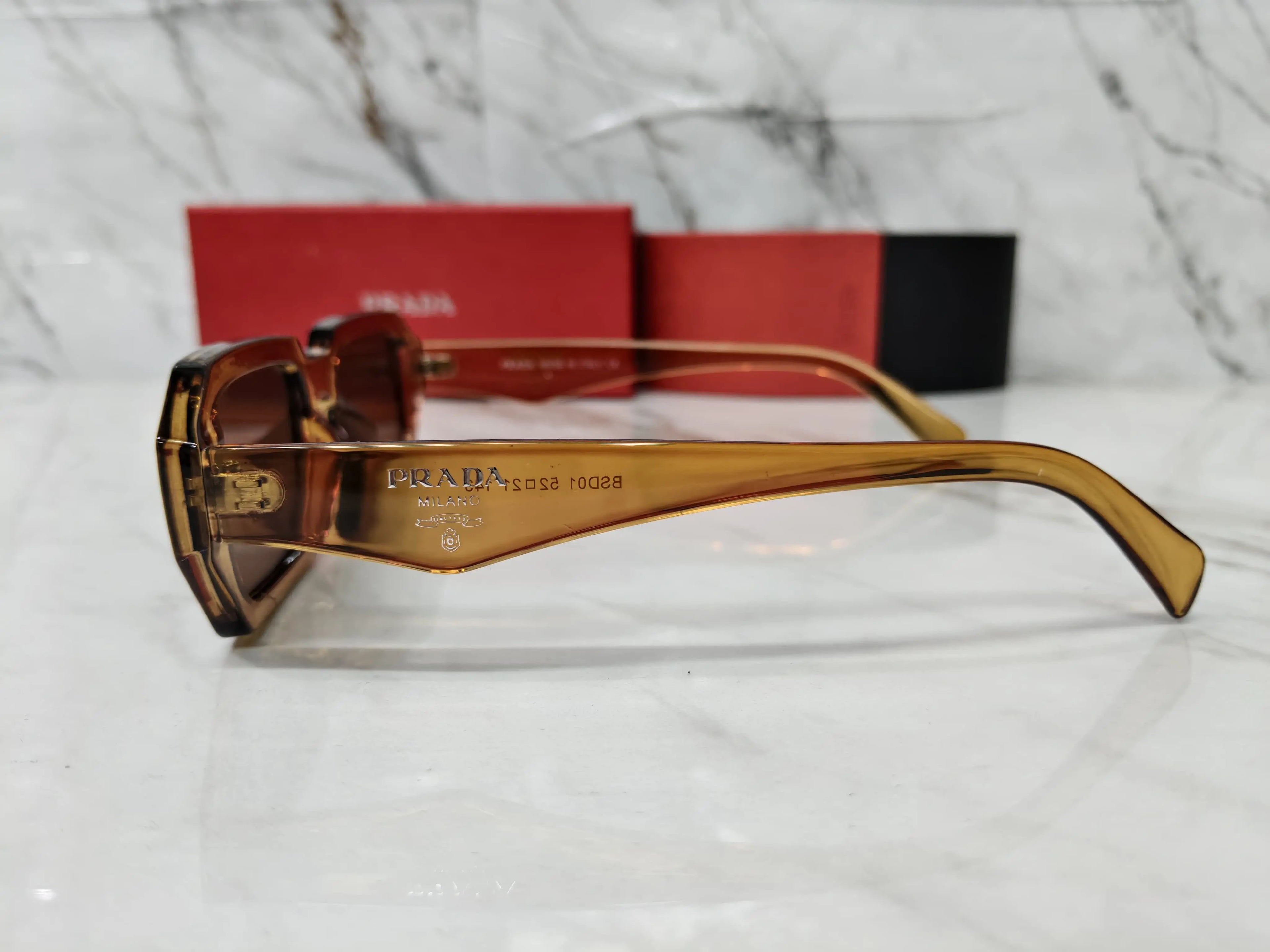PRADA 01 TRANSPARENT BROWN 
