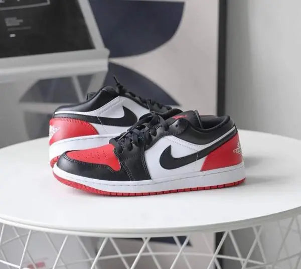 Nik_e Aur Jordan Retro 1 Low Bred Toe 